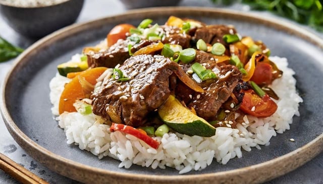 Vegan Steak Stir-Fry Over Rice.