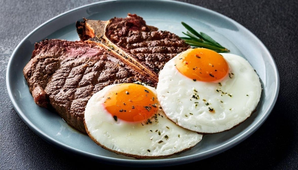 2 Eggs with New York Strip Steak.